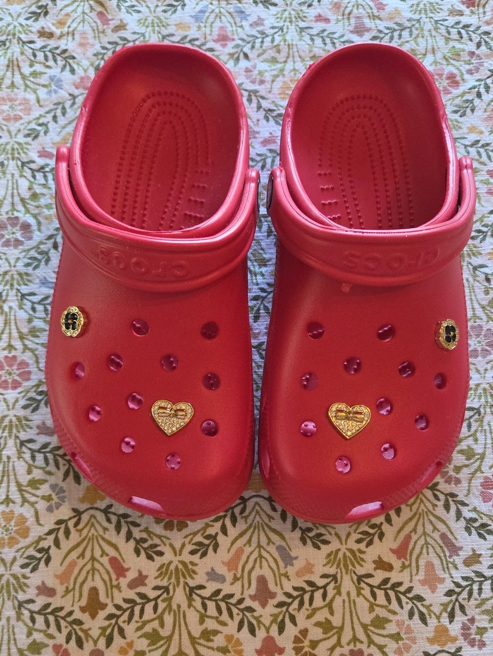 CROCS Red Clogs with Gold Heart Charms